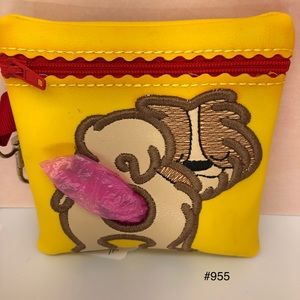 Shih Tzu waste disposal bag holder.